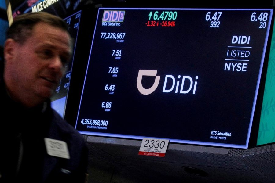 A screen displays trading information for ride-hailing giant Didi Global on the floor of the New York Stock Exchange (NYSE) in New York City, US, 3 December 2021. (Brendan McDermid/Reuters)