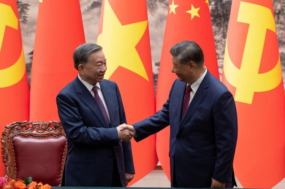 Chinese President Xi Jinping and Vietnam’s President To Lam shake hands after a signing ceremony at the Great Hall of the People in Beijing, China, 19 August 2024. (Andres Martinez Casares via Reuters)