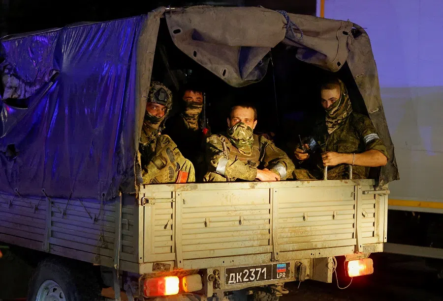 Fighters of Wagner private mercenary group pull out of the headquarters of the Southern Military District to return to base, in the city of Rostov-on-Don, Russia, 24 June 2023. (Alexander Ermochenko/File Photo/Reuters)