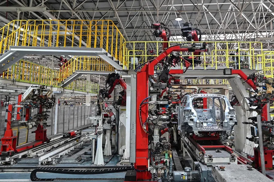A general view shows an electric vehicle production line at the Leapmotor factory in Jinhua, Zhejiang province, China, on 18 September 2024. (Adek Berry/AFP)