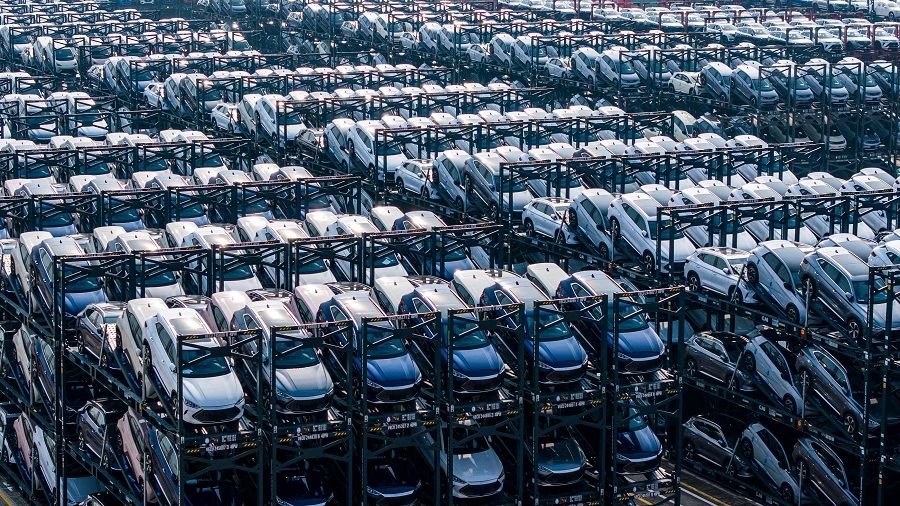 BYD electric cars waiting to be loaded onto a ship are seen stacked at the international container terminal of Taicang Port in Suzhou, Jiangsu province, China, on 8 February 2024. (AFP)