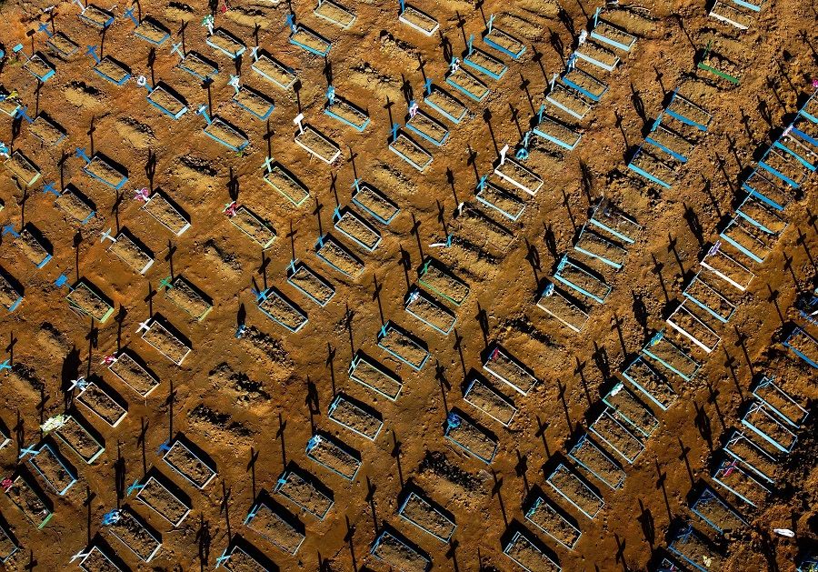 This aerial file photo taken on 21 June 2020 shows graves in the Nossa Senhora Aparecida cemetery in Manaus, Brazil. (Michael Dantas/AFP)