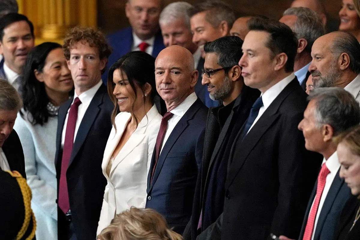 From left to right, CEO of Meta Mark Zuckerberg, Lauren Sanchez, US businessman Jeff Bezos, CEO of Alphabet Inc and Google Sundar Pichai and Tesla and SpaceX CEO Elon Musk attend the inauguration ceremony where Donald Trump will sworn in as the 47th US president in the US Capitol Rotunda in Washington, DC, on 20 January 2025.