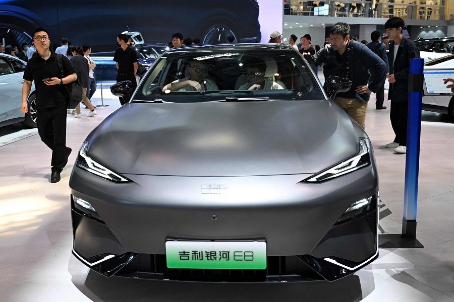A Geely E8 model car is displayed at the Beijing Auto Show on 26 April 2024. (Wang Zhao/AFP)