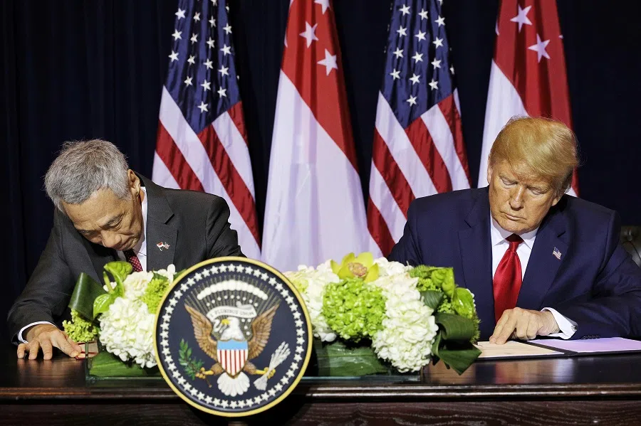 Singapore’s Prime Minister Lee Hsien Loong (left) and US President Donald Trump sign a memorandum of understanding on Singapore’s transit and logistics support for the US military at the Intercontinental New York Barclay in New York on 23 September 2019. (SPH Media)