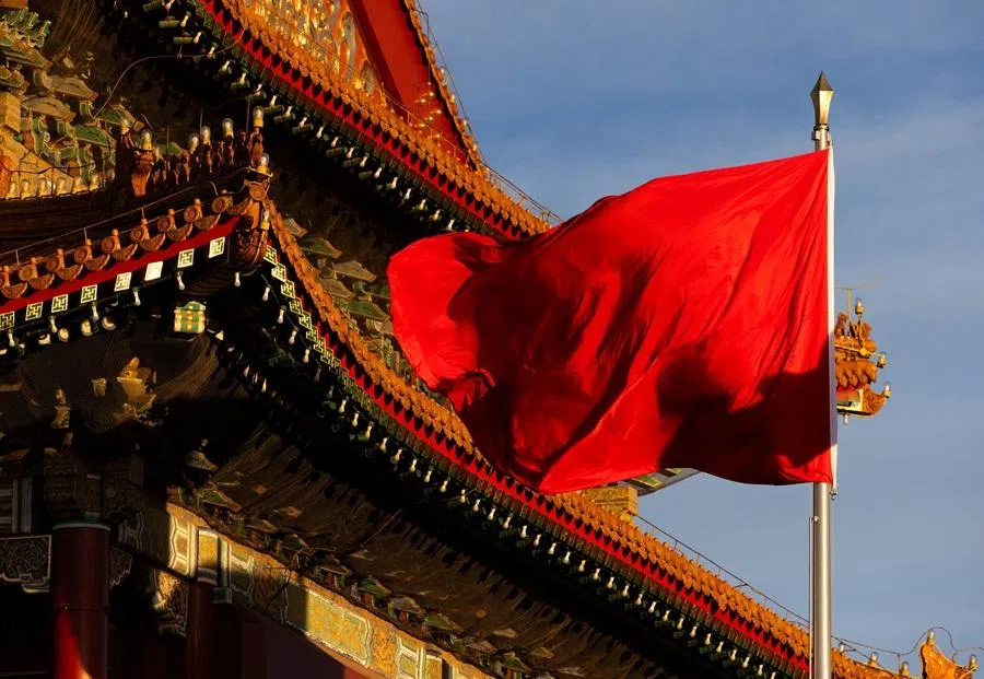 A red flag flutters near Tiananmen Gate, in Beijing, China, on 20 November 2025.