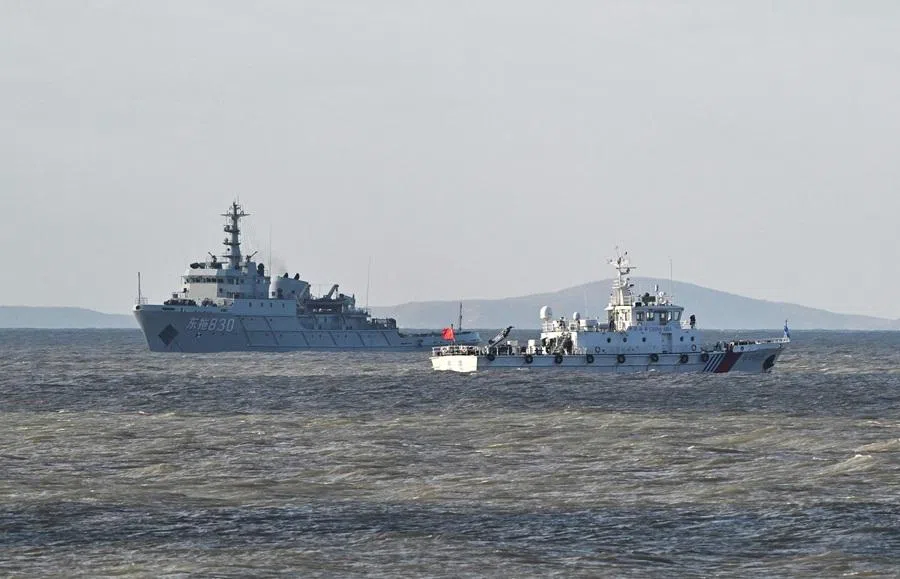 Chinese ships patrol as the People’s Liberation Army (PLA) conduct military drills on Pingtan island, Fujian province, the closest point to Taiwan, on 30 December 2025. (Adek Berry/AFP)