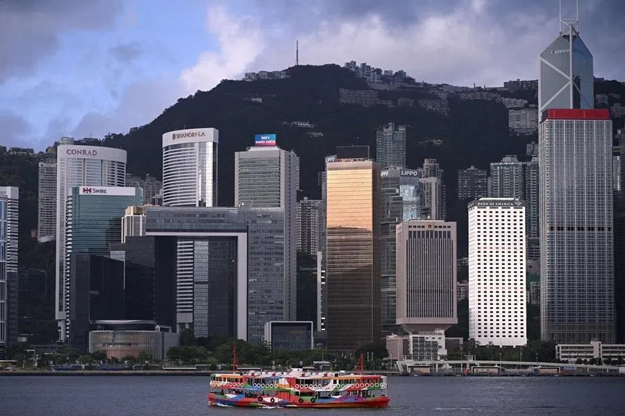 This photo taken on 1 July 2026 shows a Star Ferry sailing past the Hong Kong skyline and Victoria Harbour, as seen from Kowloon.