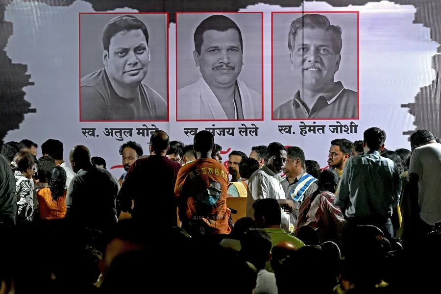 Mourners gather to pay their homage to the mortal remains of (left to right) Atul Mone, Sanjay Lele, Hemant Joshi, who were killed by gunmen in Kashmir’s Pahalgam, after their bodies arrived for funeral in Dombivali on 23 April 2025. Indian security forces in Kashmir carried out a major manhunt on 23 April, a day after gunmen opened fire on tourists killing 26 people in the region’s deadliest attack on civilians since 2000. (Indranil Mukherjee/AFP)