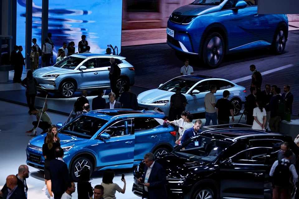 A general view of visitors looking at models from BYD, a Chinese automobile manufacturer, ahead of the official opening of the 2023 Munich Auto Show IAA Mobility, in Munich, Germany, on 4 September 2023. (Leonhard Simon/Reuters)