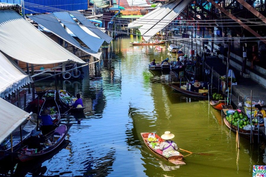 This photograph taken on 8 December 2020 shows a vendor steering her boat while looking for customers at the Damnoen Saduak floating market, nearly deserted with few tourists due to ongoing Covid-19 coronavirus travel restrictions, some 100km southwest of Bangkok. (Mladen Antonov/AFP)