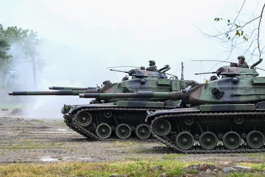 Army soldiers operate US-made M60A3 tanks during an anti-infiltration exercise in Taitung, Taiwan, on 31 January 2024. (Sam Yeh/AFP)