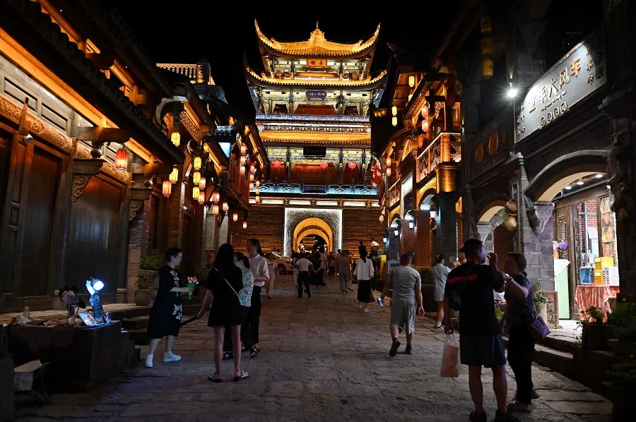 This picture taken on 20 June 2024 shows people visiting Jianchang Gucheng in Xichang city of the Liangshan Yi Autonomous Prefecture, Sichuan province, China. (Adek Berry/AFP)