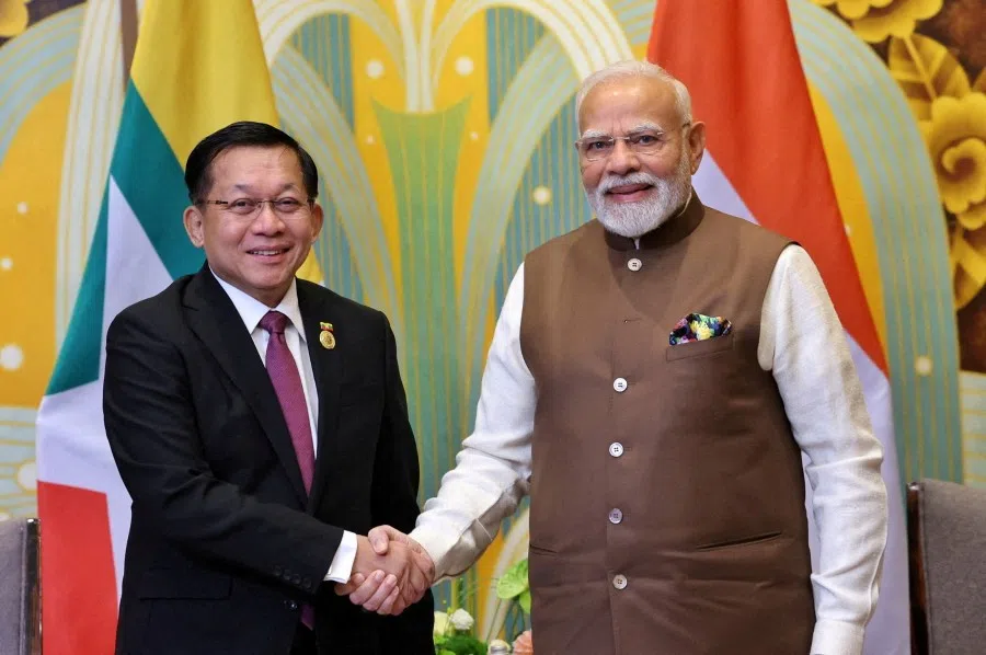 India’s Prime Minister Narendra Modi shakes hands with Myanmar’s military chief Min Aung Hlaing during a meeting on the sidelines of Shanghai Cooperation Organisation (SCO) Summit in Tianjin, China, on 31 August 2025. (India’s Press Information Bureau/Handout via Reuters)