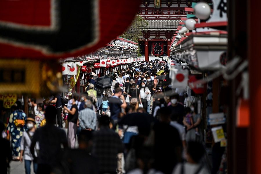 People visit Sensoji temple in Tokyo's Asakusa district on 22 September 2020. (Charly Triballeau/AFP)