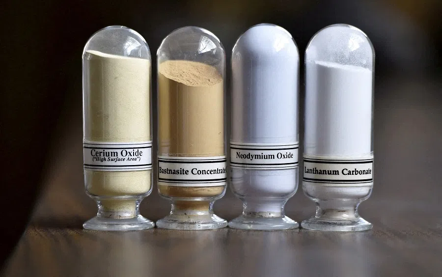 Samples of rare earth minerals from left, Cerium oxide, Bastnasite, Neodymium oxide and Lanthanum carbonate are on display during a tour of Molycorp’s Mountain Pass Rare Earth facility in Mountain Pass, California, on 29 June 2015. (David Becker/Reuters)