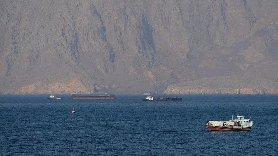 Ships and tankers in the Strait of Hormuz off the coast of Musandam, Oman, on 18 April 2026.