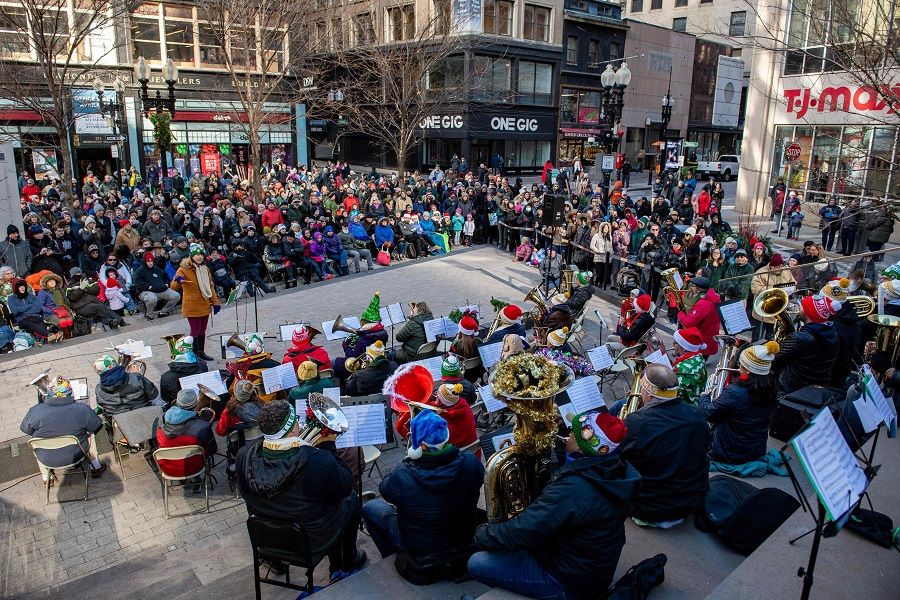 Musicians perform holiday songs during the 50th anniversary of "Tuba Christmas" at Downtown Crossing in Boston, Massachusetts, on 25 November 2023. (Joseph Prezioso/AFP)
