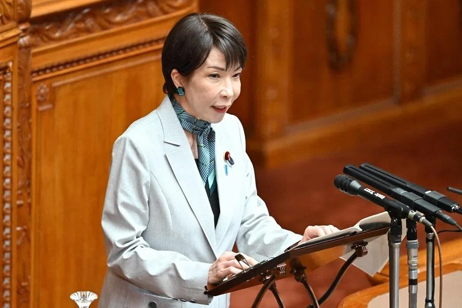 Japan's Prime Minister Sanae Takaichi answers questions regarding the bill to establish the National Intelligence Council during a House of Councillors plenary session at the parliament in Tokyo on 8 May 2026.