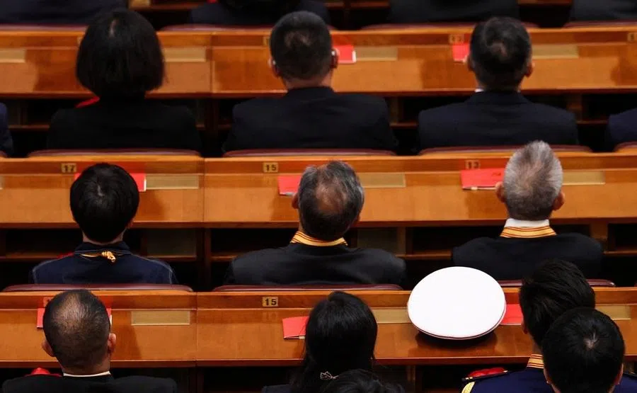People listen to the speech of Chinese President Xi Jinping during a ceremony marking the 105th anniversary of the founding of the Communist Party of China at the Great Hall of the People in Beijing, China, on 1 July 2026.