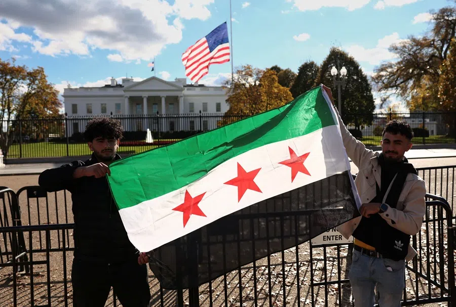 A Syrian flag is displayed outside the White House following the meeting of US President Donald Trump and Syrian President Ahmed al-Sharaa in the Oval Office of the White House in Washington, DC, US, 10 November 2025. (Kevin Lamargue/Reuters)