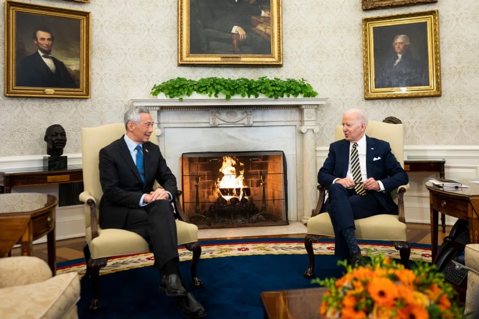 US President Joe Biden meets with Lee Hsien Loong, Singapore's prime minister (left), in the Oval Office of the White House in Washington, DC, US, on 29 March 2022. (Doug Mills/The New York Times/Bloomberg)