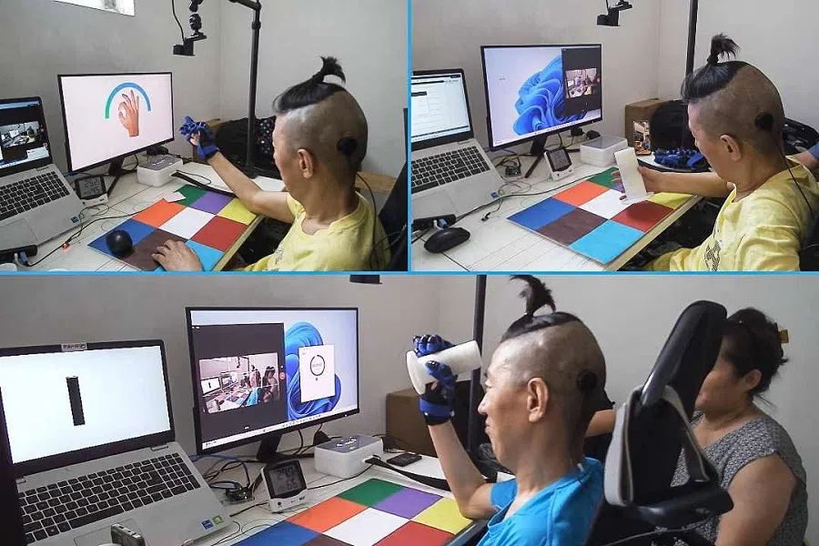 Respondents demonstrate grip training via a brain-computer interface.