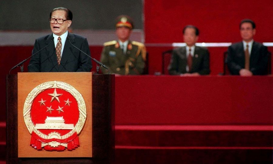 Chinese President Jiang Zemin delivers his speech during the handover ceremony in Hong Kong at midnight, 1 July 1997. (Kimimasa Mayama/File Photo/Reuters)