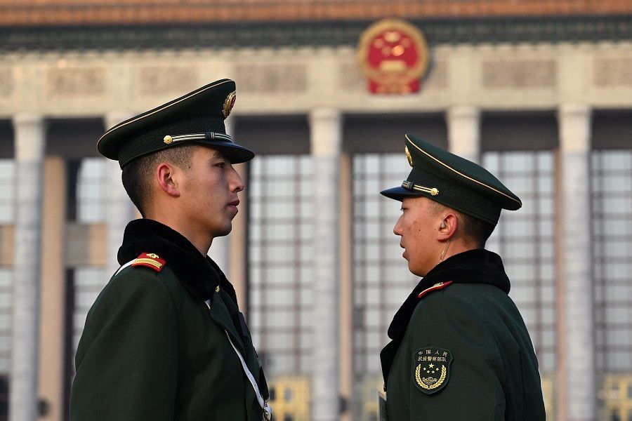 Paramilitary police stand guard ahead of the second plenary session of the Chinese People's Political Consultative Conference (CPPCC) at the Great Hall of the People in Beijing, China on 7 March 2024. (Jade Gao/AFP)
