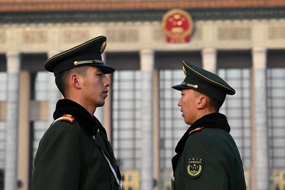 Paramilitary police stand guard ahead of the second plenary session of the Chinese People's Political Consultative Conference (CPPCC) at the Great Hall of the People in Beijing, China on 7 March 2024. (Jade Gao/AFP)