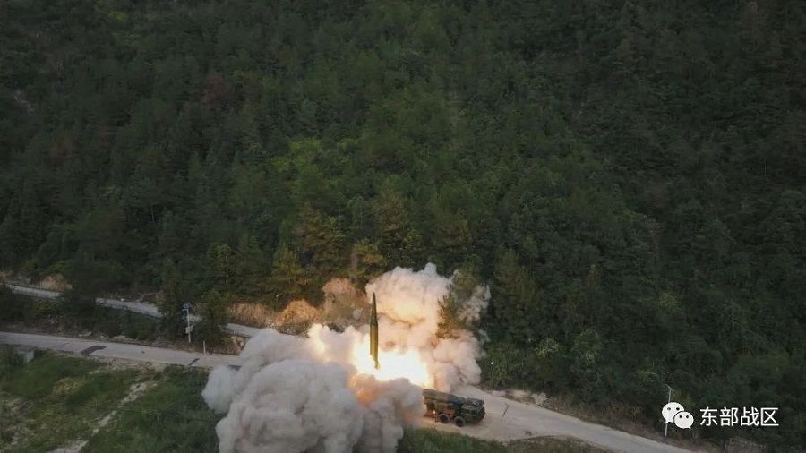 The Rocket Force under the Eastern Theatre Command of China's People's Liberation Army (PLA) conducts conventional missile tests into the waters off the eastern coast of Taiwan, from an undisclosed location in this 4 August 2022 handout released on 5 August 2022. (Eastern Theatre Command/Handout via Reuters)