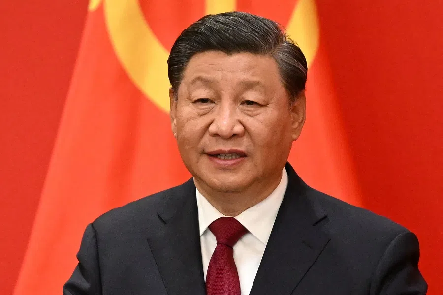 This file photo taken on 23 October 2022 shows China's President Xi Jinping speaking during the introduction of members of the Chinese Communist Party's new Politburo Standing Committee, the nation's top decision-making body, to the media in the Great Hall of the People in Beijing. (Noel Celis/AFP)