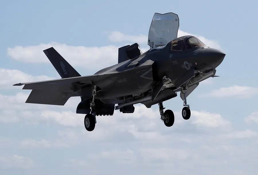 A Marine Corps pilot prepares for a vertical landing of Lockheed Martin F-35B stealth fighter aboard the USS Wasp (LHD 1) amphibious assault carrier in the waters off Japan's southernmost island of Okinawa, 23 March 2018. (Issei Kato/File Photo/Reuters)