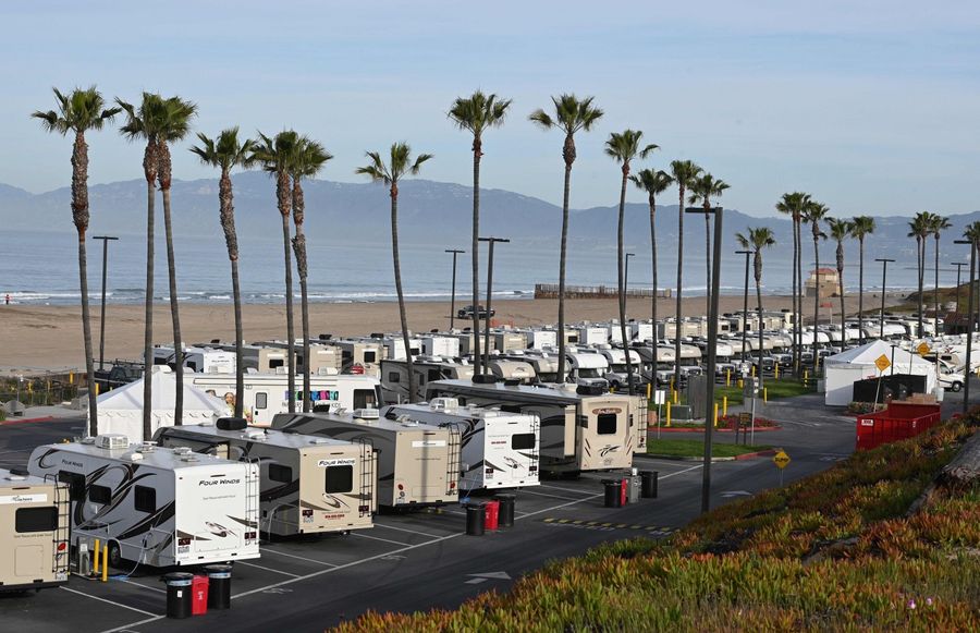 RV campers in a beachside parking lot being used as an isolation zone for people with Covid-19, on 31 March 2020, at Dockweiler State Beach in Los Angeles, California. (Robyn Beck/AFP)