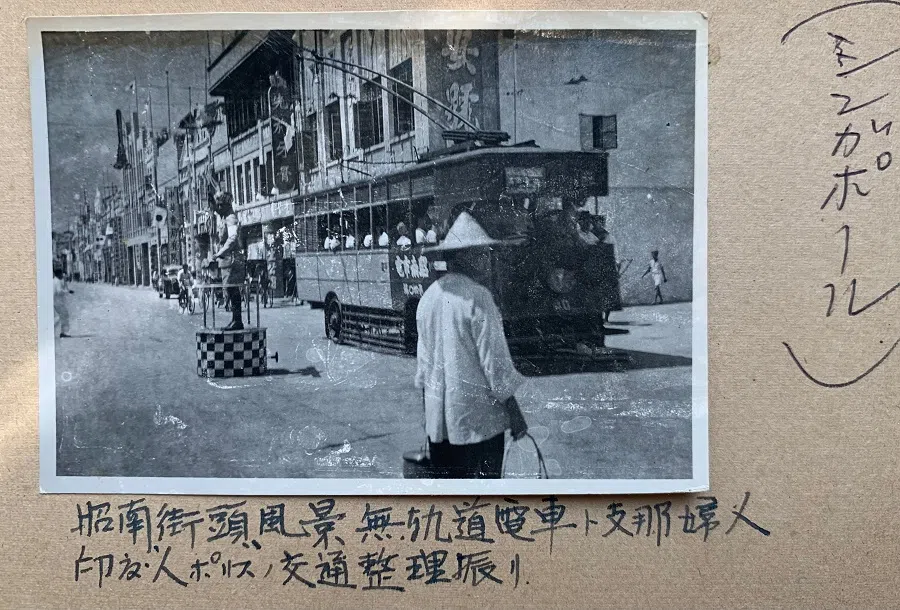 A tram amid traffic in Singapore, late February 1942.