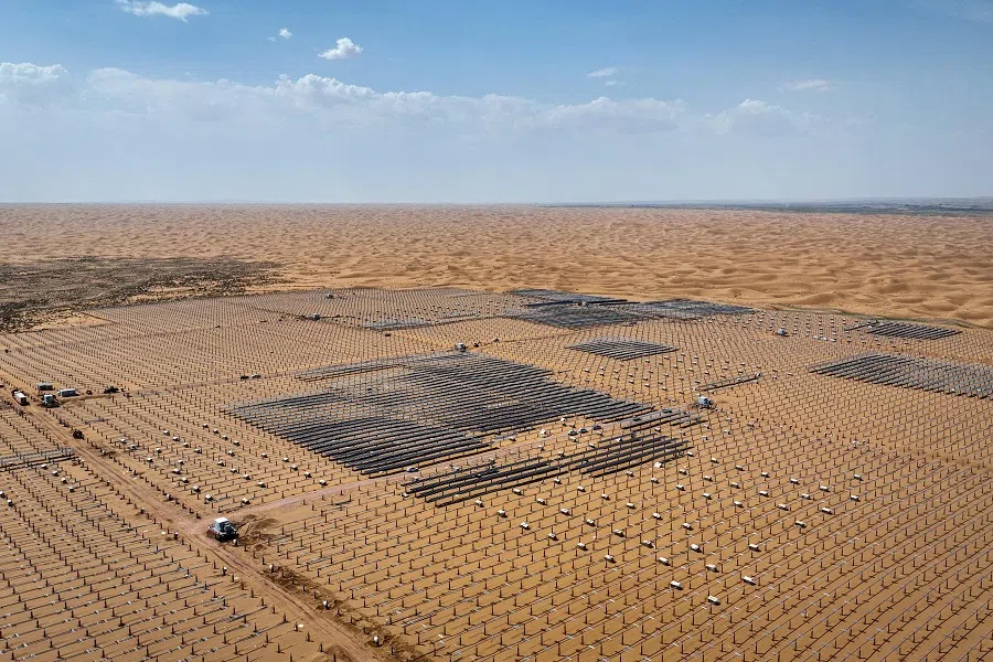 This file photo taken on 9 May 2024 shows solar panels under construction at the Ningxia Tengger Desert New Energy Base in Zhongwei, Ningxia Hui Autonomous Region, China. (AFP)