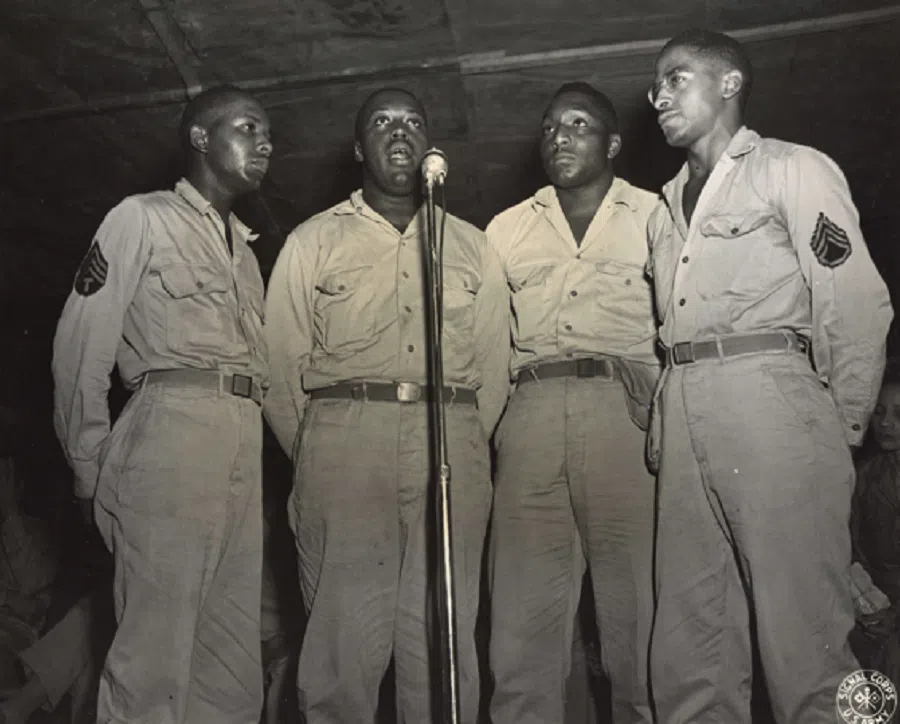 On 22 August 1944, the music group Q.M.T.O. performs the song Over My Head.