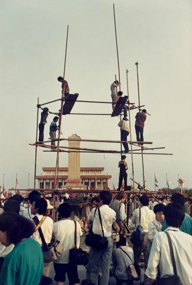 The Goddess of Democracy statue about to be erected.