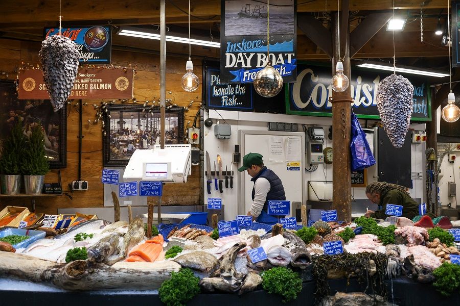 Fresh fish for sale on a fishmongers stall at Borough Market in London, UK, on 15 December 2021. (Hollie Adams/Bloomberg)