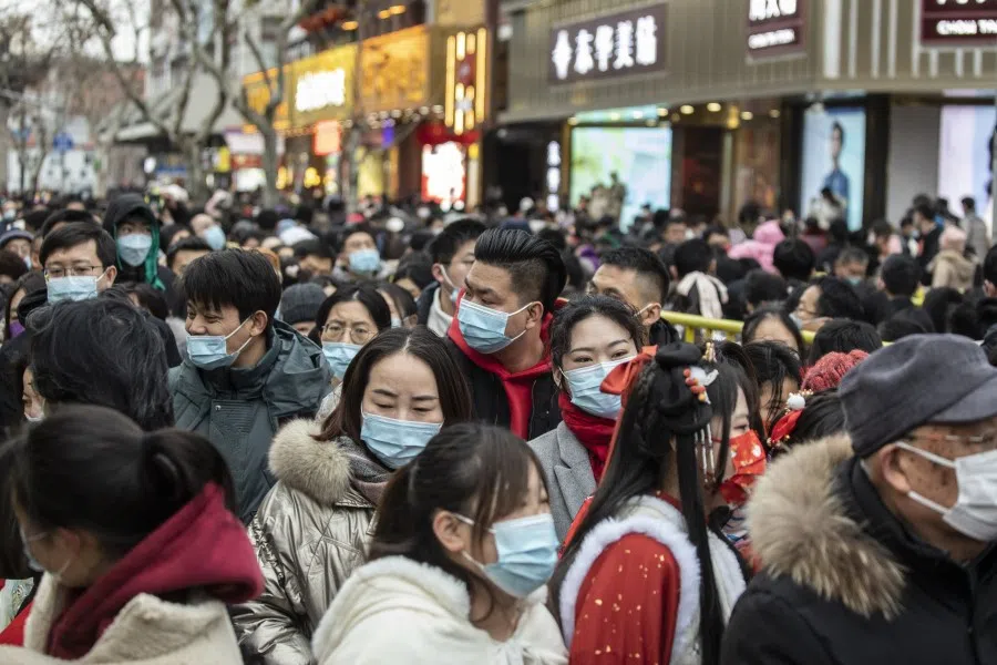 Shoppers line up to enter a shopping mall in Shanghai, China, on 2 February 2022. (Qilai Shen/Bloomberg)
