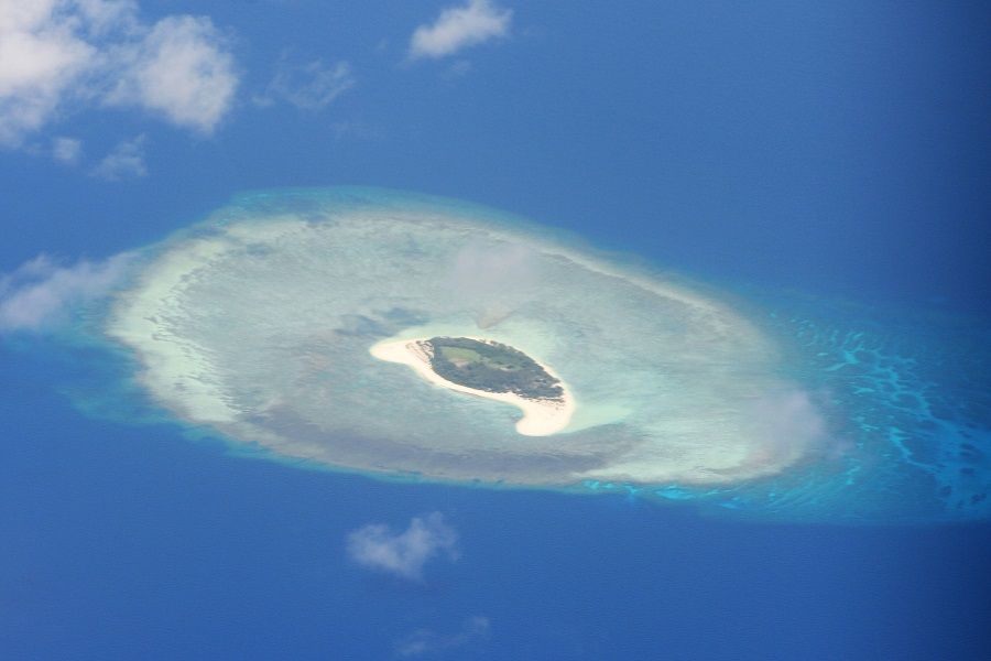This file photo taken on 21 April 2017 shows an aerial shot of a reef in the disputed Spratly islands. (Ted Aljibe/AFP)