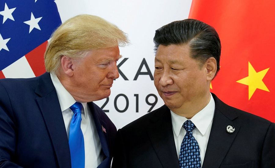 US President Donald Trump meets with China's President Xi Jinping at the start of their bilateral meeting at the G20 leaders summit in Osaka, Japan on 29 June 2019. (Kevin Lamarque/Reuters)