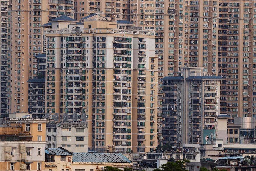 This picture taken on 7 April 2023 shows residential buildings and apartments in Guangzhou, Guangdong province, China. (Ludovic Marin/AFP)