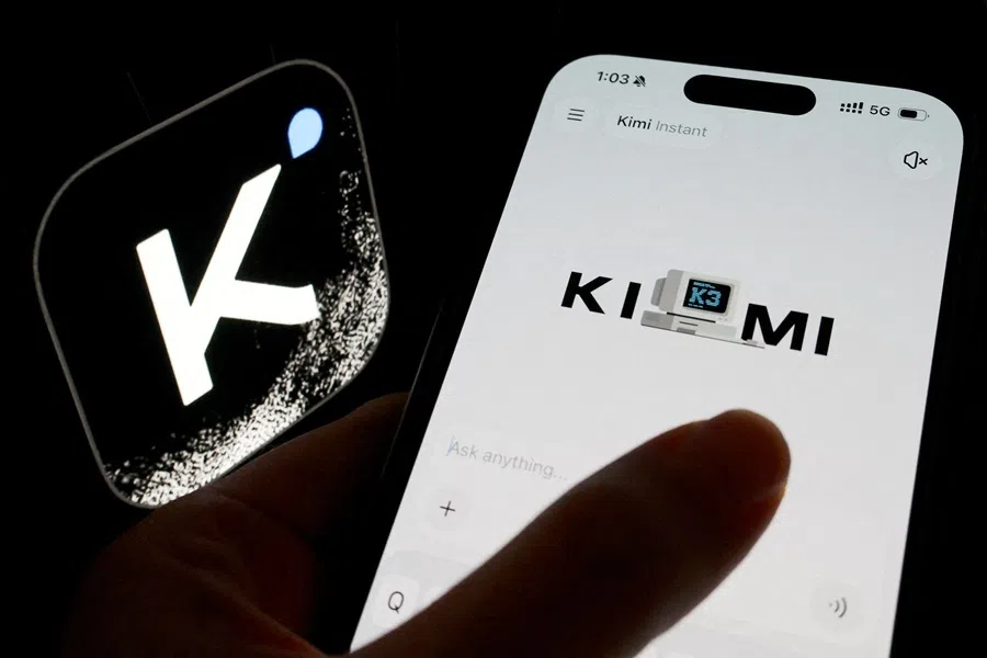 The app icon of Chinese company Moonshot AI's Kimi is displayed alongside the app on a mobile phone, in this illustration picture taken 24 July 2026.