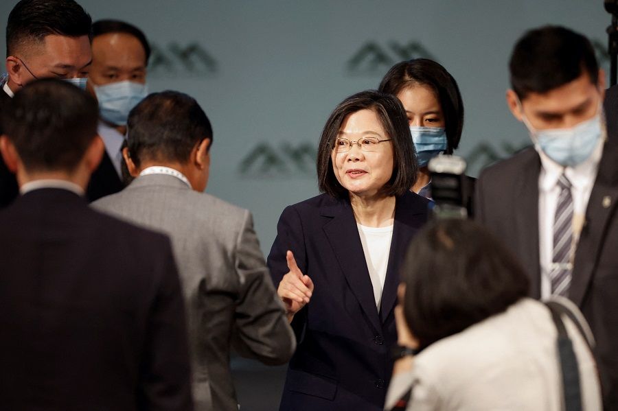 Taiwan President Tsai Ing-wen speaks with Japan's former prime minister and current Vice-President of the ruling Liberal Democratic Party Taro Aso, during the Ketagalan forum in Taipei, Taiwan, on 8 August 2023. (Carlos Garcia Rawlins/Reuters)