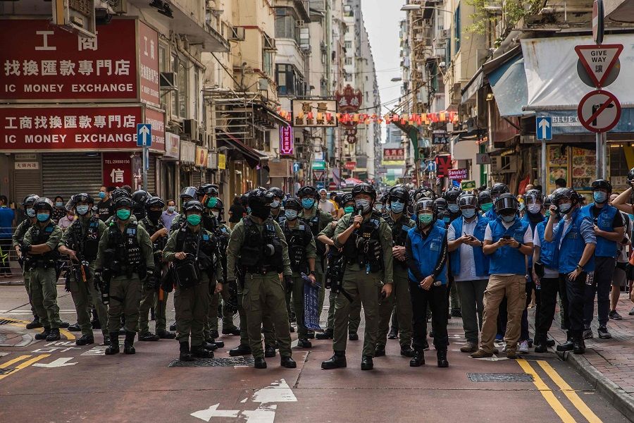 Police patrol the area after protesters called for a rally in Hong Kong on 6 September 2020 to protest against the government's decision to postpone the legislative council election due to the Covid-19 coronavirus, and the national security law. (Dale De La Rey/AFP)