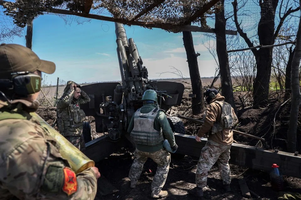 Ukrainian artillerymen prepare a BM-21 Grad multiple rocket launcher to fire towards Russian positions on the frontline, in Donetsk region on 17 April 2023. (Anatolii Stepanov/AFP)