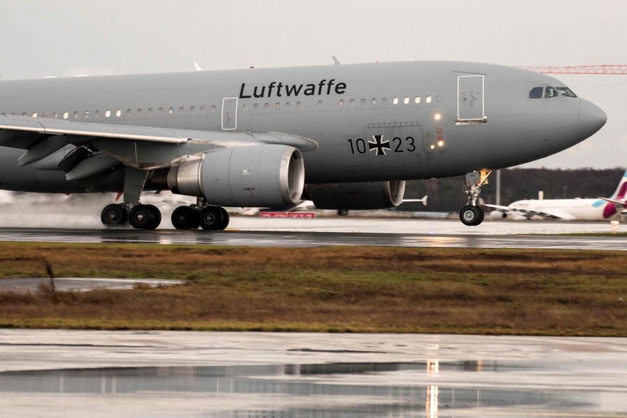 In this photo taken on 1 February 2020, German Air Force Airbus A310 "Kurt Schumacher" lands at Frankfurt am Main airport, western Germany, with on board German citizens who have been evacuated from the Chinese city of Wuhan, epicentre of the coronavirus outbreak. (Thomas Lohnes/AFP)