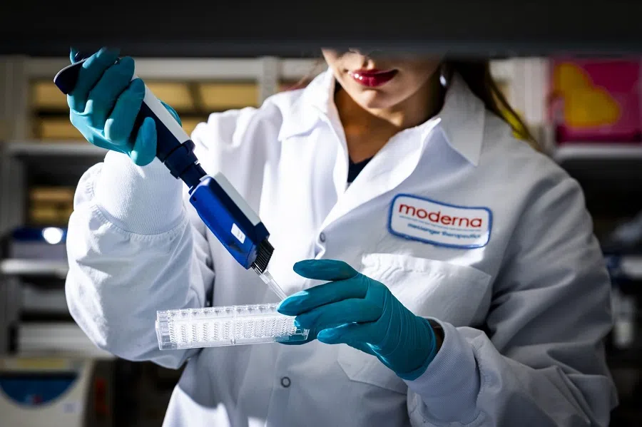 An assistant conducts cancer vaccine research in the lab at the Moderna Inc. headquarters in Cambridge, Massachusetts, US, on 26 March 2024.  (Adam Glanzman/Bloomberg)
