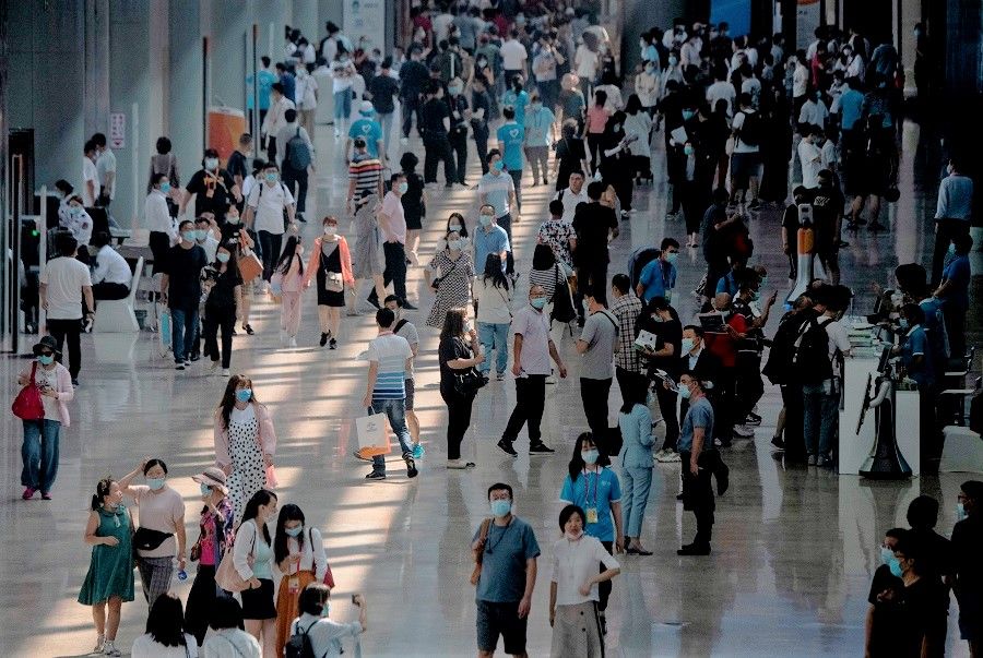People arrive at the China International Fair for Trade in Services (CIFTIS) in Beijing on 6 September 2020. (Noel Celis/AFP)